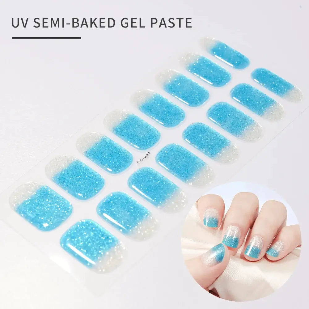 Nail sticker sheet with 16 blue glitter gradient UV gel wraps for full-cover nails