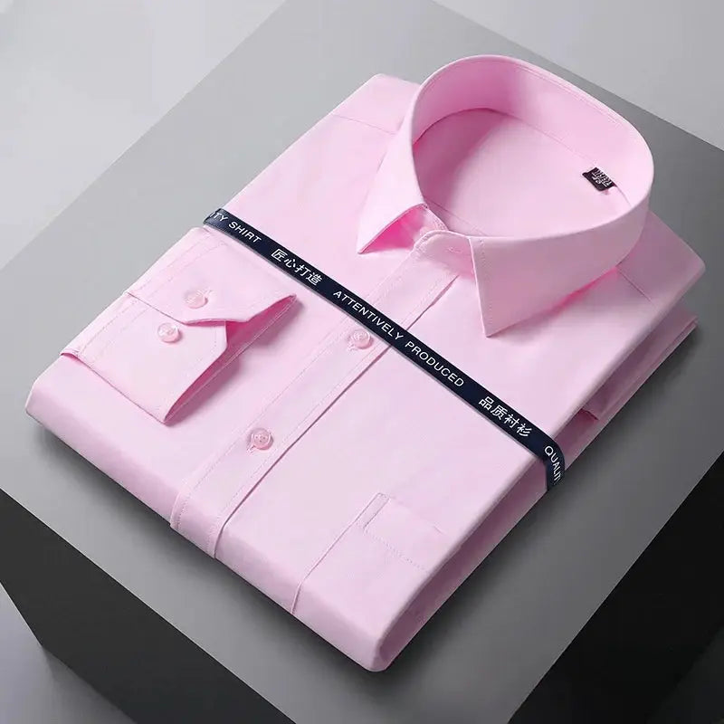 Men's pink long-sleeve dress shirt, folded with pointed collar and front buttons