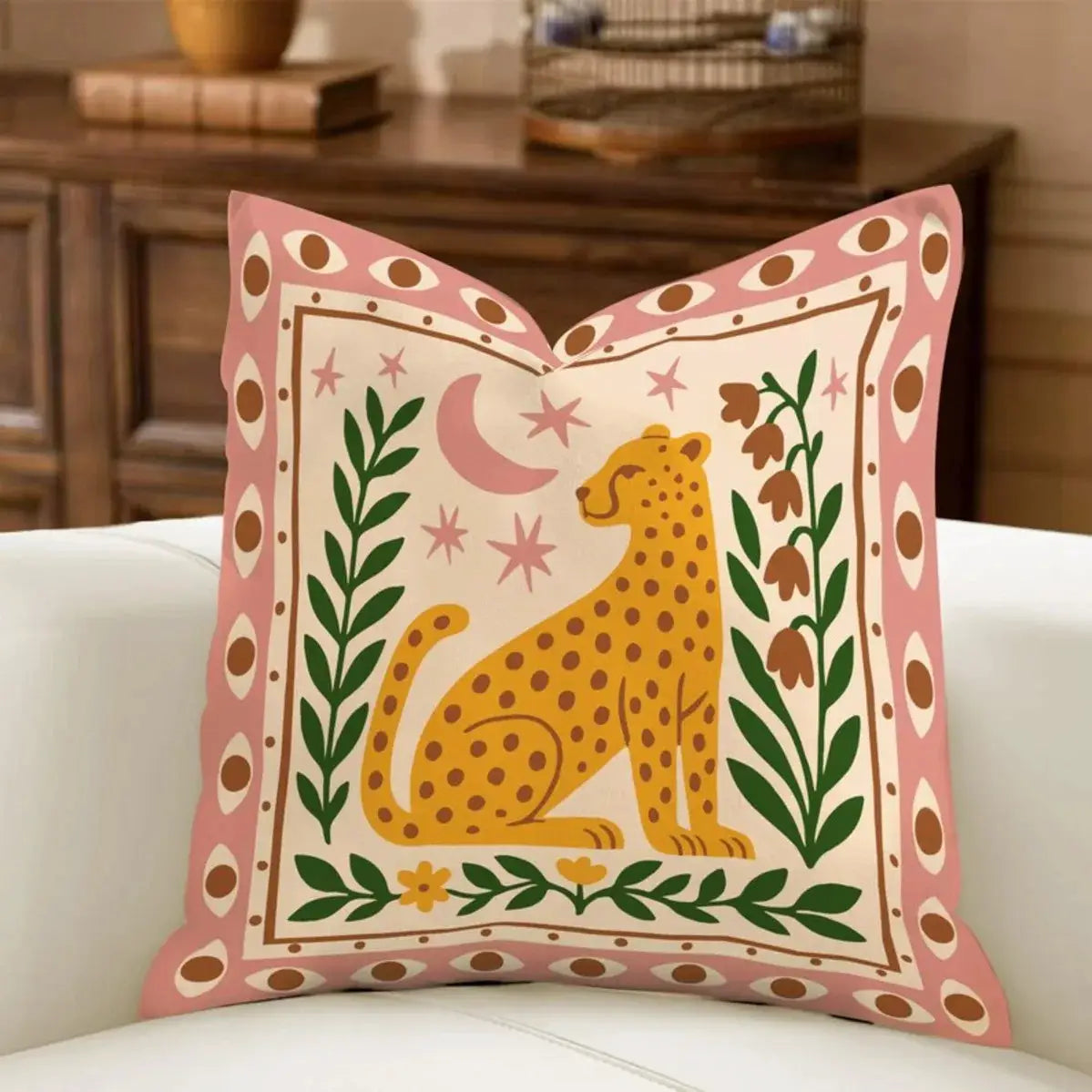 Minimal Boho leopard palm pillow cover with pink border, featuring a yellow leopard and green foliage