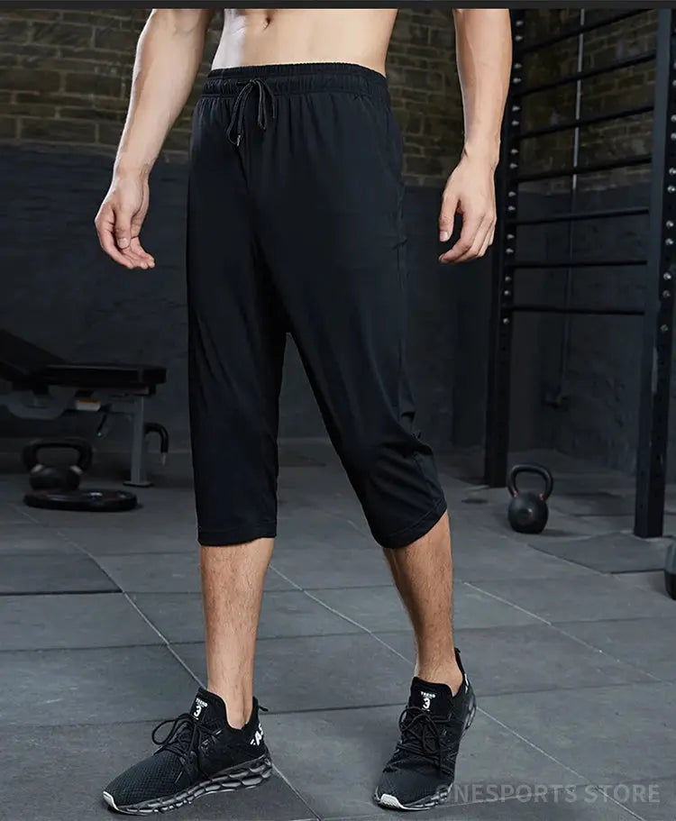 SONECHOKI men's black calf-length running pants with drawstring, quick-dry loose sport trousers