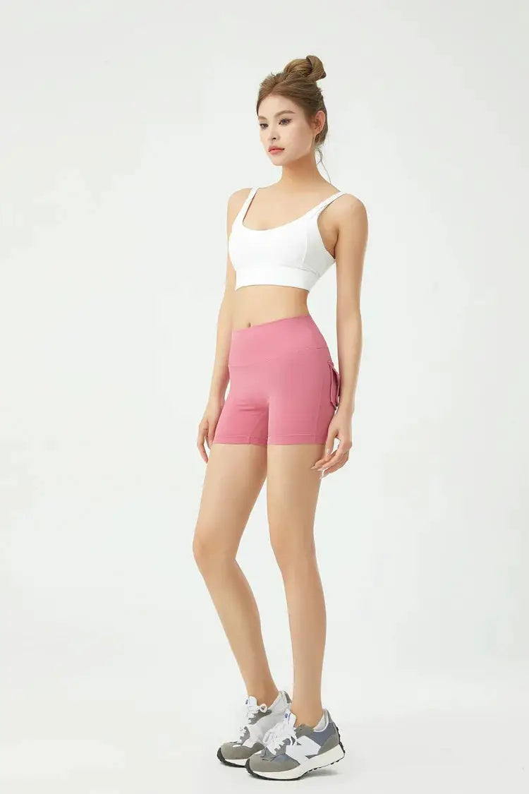 Peach pink women's fitness shorts with high waist and side pocket by Simples Market