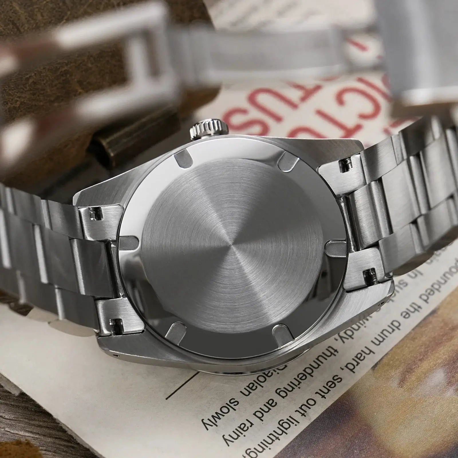 Watchdives WD1960S V2 stainless steel wristwatch with brushed back case and linked bracelet, crown visible
