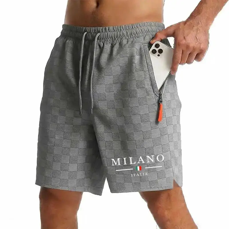Men's gray checkered shorts with drawstring waist and side zipper pocket featuring Milano Italia logo