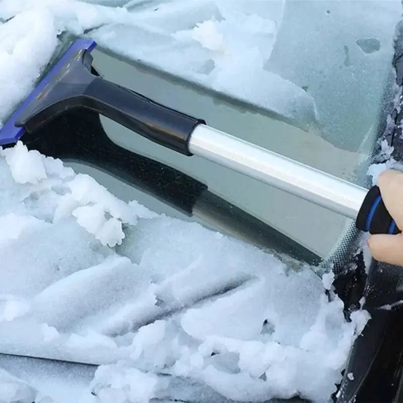 Extendable aluminum snow brush ice scraper with blue head, extra-long handle for clearing a car windshield.