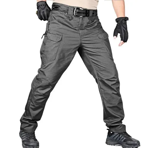 Simples Market men's tactical cargo pants in dark gray with multiple pockets and belt