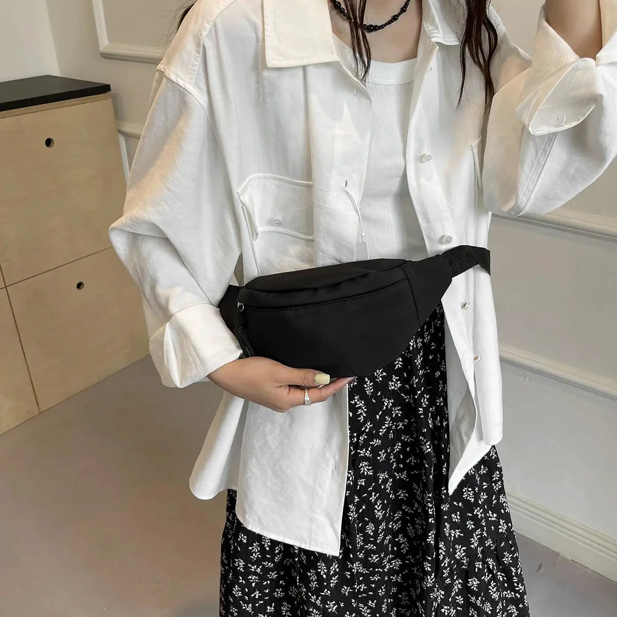 Fanny pack waist bag in black with adjustable strap by Simples Market.