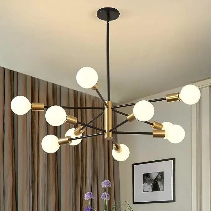 Nordic LED chandelier with black and brass arms and globe bulbs, minimalist modern decor