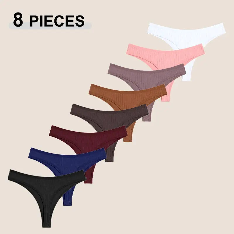 Cotton seamless thong underwear for women; 8-piece set in assorted solid colors, low-rise and breathable.