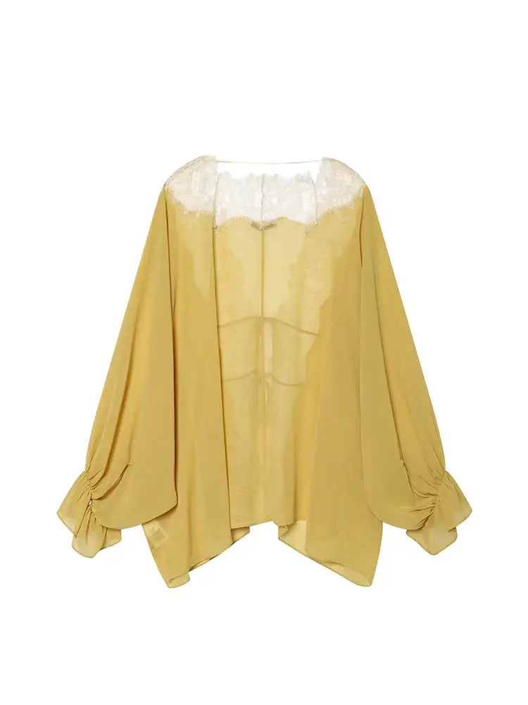 Lace patchwork lantern-sleeve blouse in yellow, sheer with lace yoke and tie-up detail
