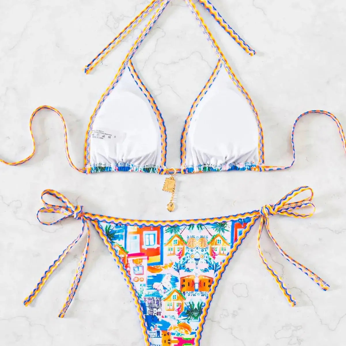 Simples Market 2026 Triangle Bikini Set, white triangle top with colorful braided trim and tropical Brazilian bottoms