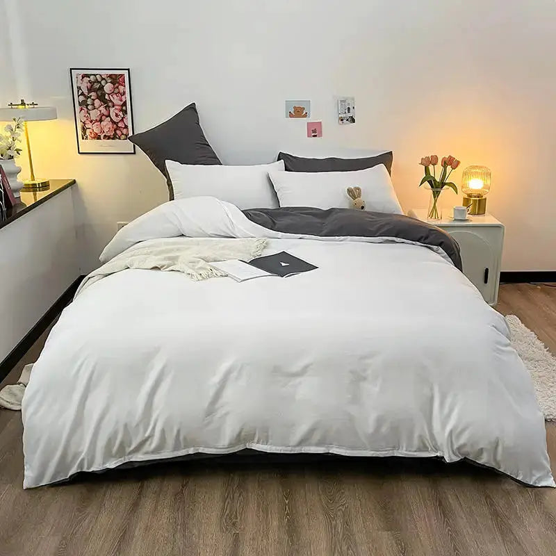 Duvet cover for double bed in white with dark gray accent trim