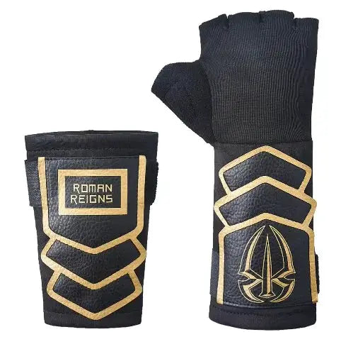 Two black wrist wraps with gold geometric accents; left shows Roman Reigns logo, right features crest emblem