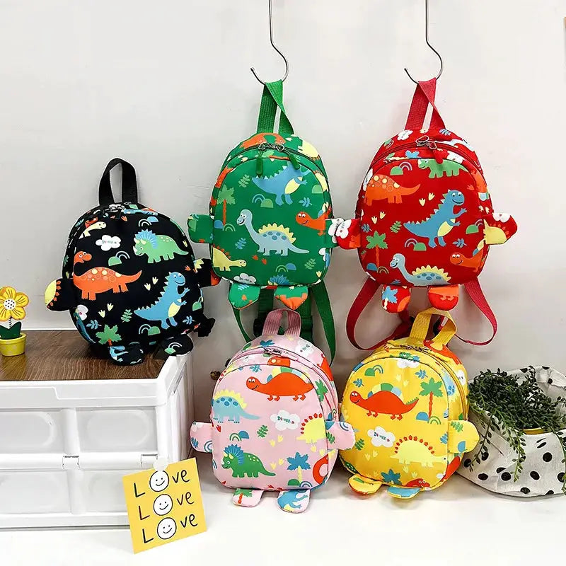 Cute children dinosaur backpacks set by Simples Market; five colorful anti-lost backpacks for boys and girls.