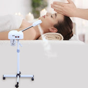 Ozone facial steamer on a wheeled white stand for professional skin care