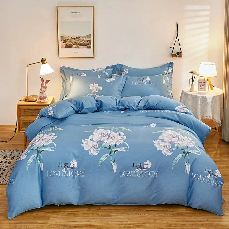3-piece blue cotton duvet cover set with white floral print and two matching pillowcases