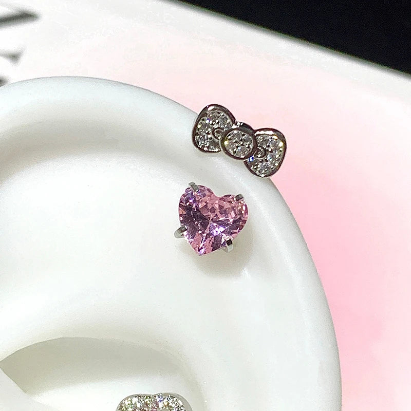 Simples Market 2-piece stainless steel ear stud set: bowknot zircon earrings and pink heart gemstone stud