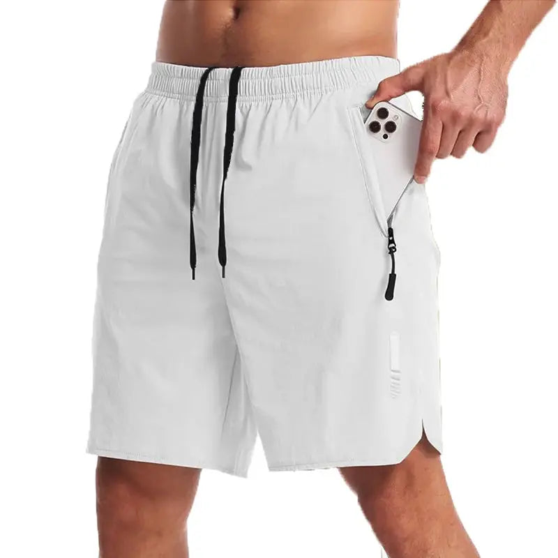 Men's sport shorts in light gray with black drawstrings and a side zip pocket holding a phone.