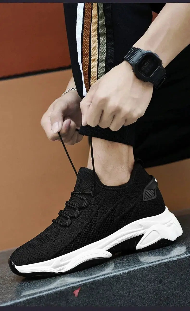 Men's height-increasing sneakers with a black knit upper and white chunky sole, lacing shown.