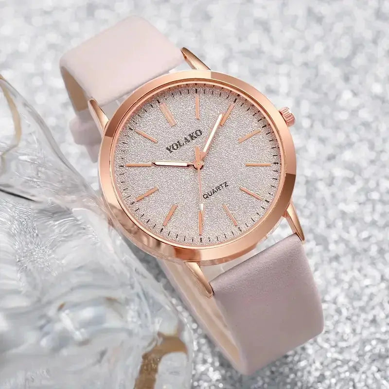 Women's rose-gold leather watch with a glittery round dial, pink strap, quartz movement