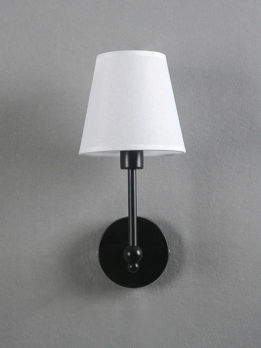 American retro wall lamp with black round backplate, metal stem and white fabric shade