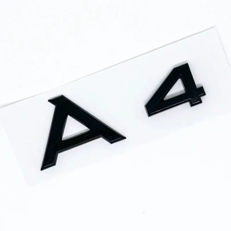 A4 3D car badge sticker in black ABS on white backing