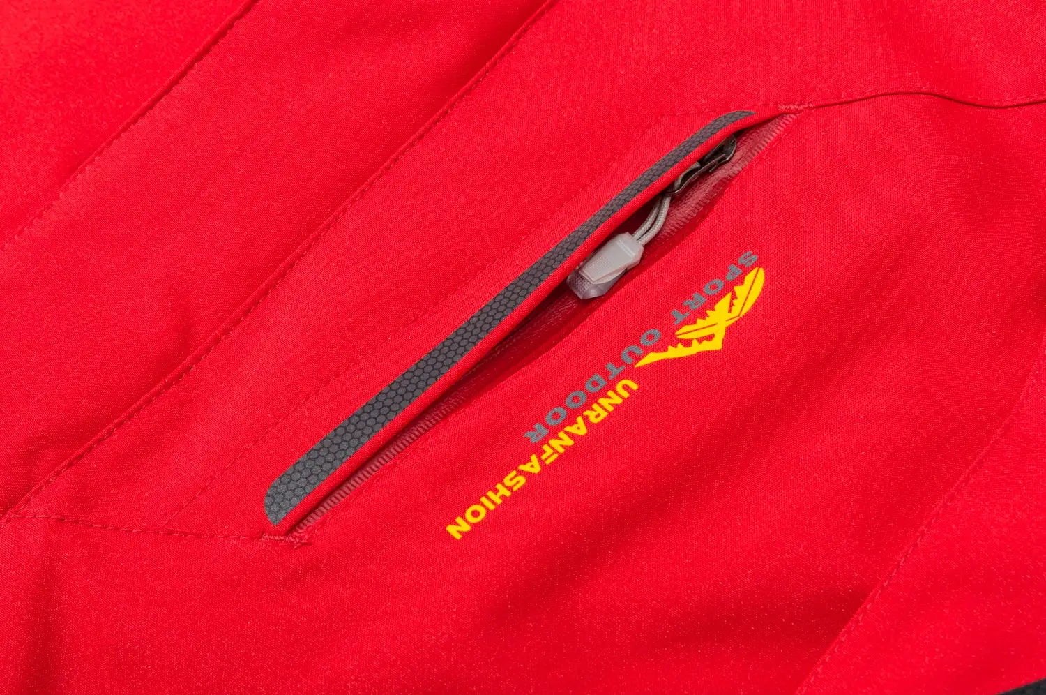Men's red waterproof hiking jacket with gray zipper pull and zip chest pocket