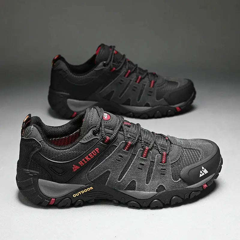 Pair of HIKEUP men's hiking shoes in black suede leather for outdoor trekking