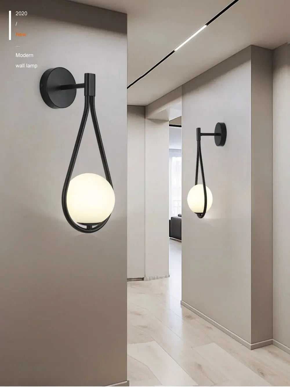 Nordic glass ball LED wall lamp by Simples Market; black metal frame with frosted globe, pair on walls