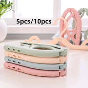 Foldable portable clothes hanger set for travel in pastel colors, plastic construction, 5–10 pieces