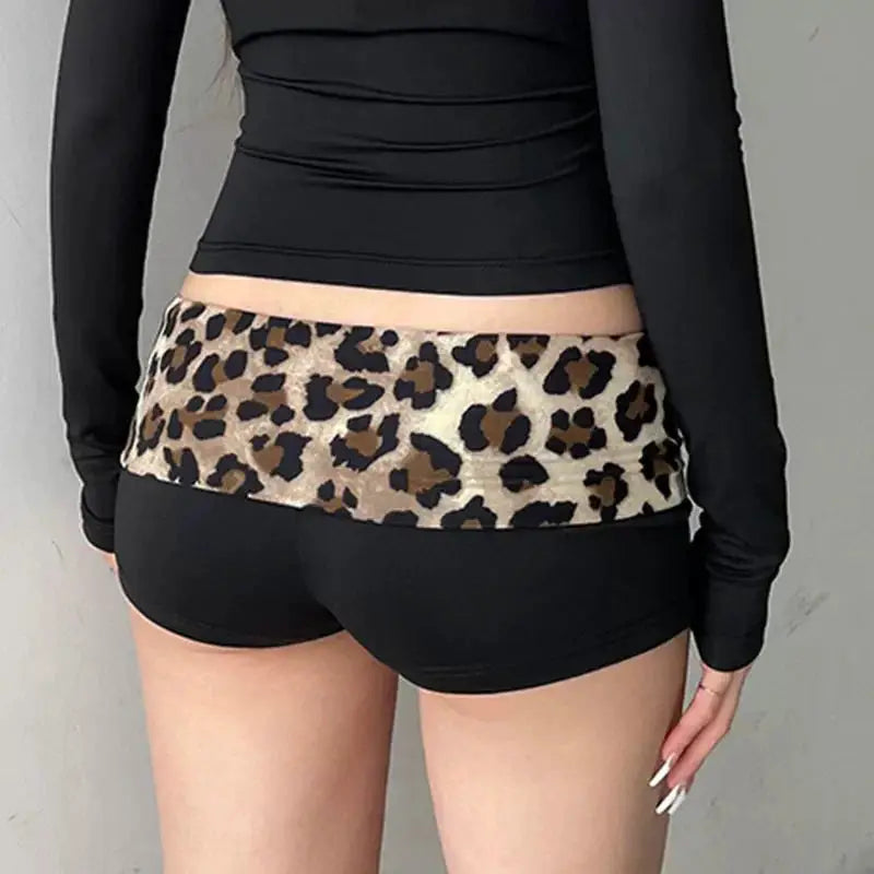 Women's black low-waist booty shorts with a leopard-print contrast waistband.