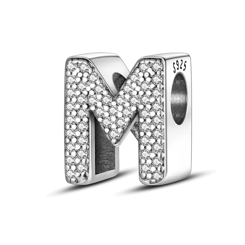 M-shaped sterling silver charm with pave CZ stones and 925 stamp