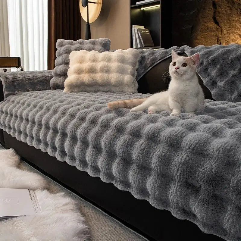 Simples Market thick faux rabbit fur sofa slipcover in grey with matching plush cushions on a modern living room couch