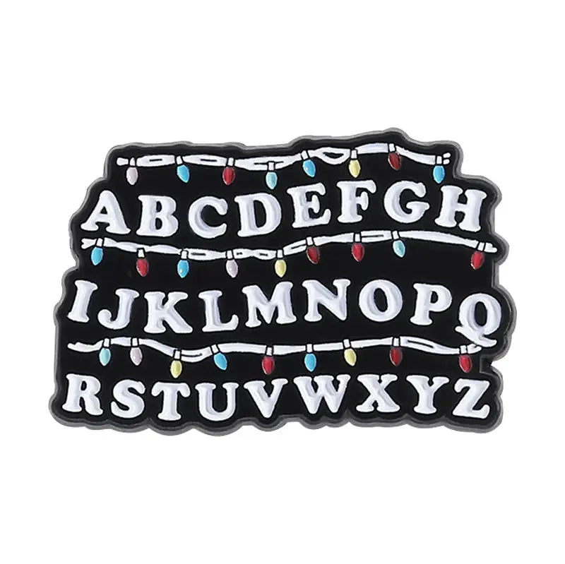 Sci Fi Horror Enamel Pins Cannibal Flowers and 26 English Letter Brooches for Backpacks Lapels and Gifts