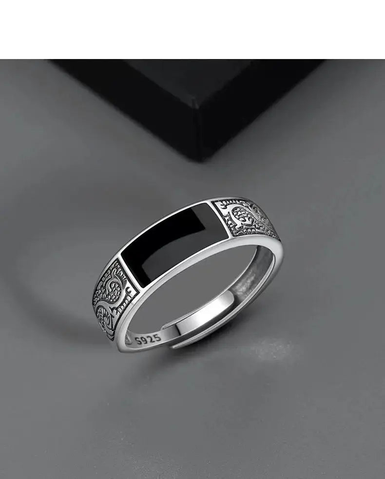Men's 925 sterling silver ring with black zircon inlay and ornate engraved shoulders