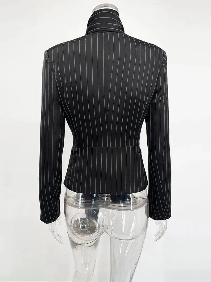 Black pinstripe blazer on mannequin back view with a fitted waist and long sleeves.