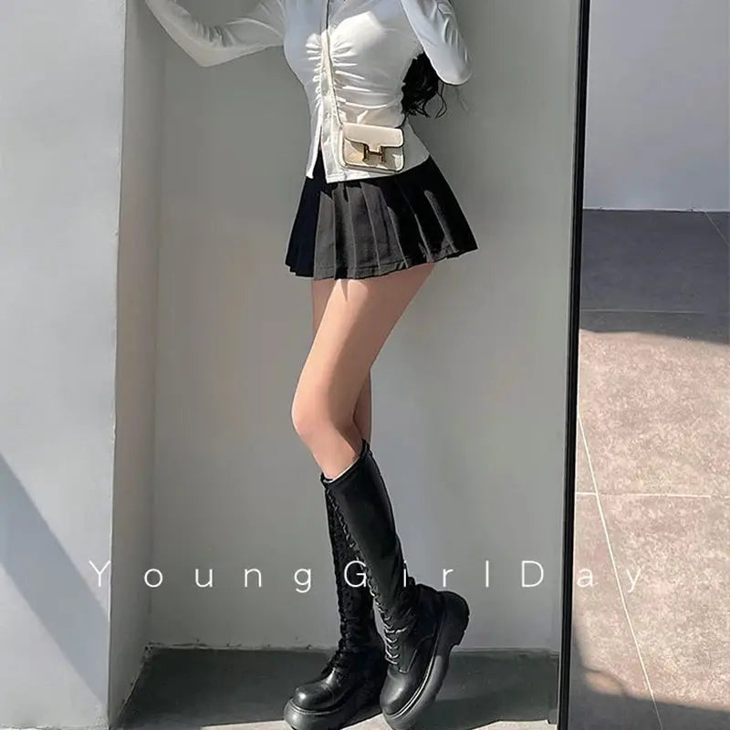 Pleated skirt with built-in shorts, black mini, high-waist A-line for women