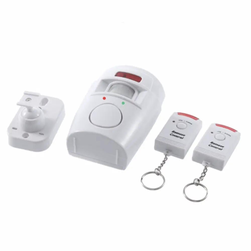 Wireless motion sensor alarm system by Simples Market with 2 white remotes and mounting base