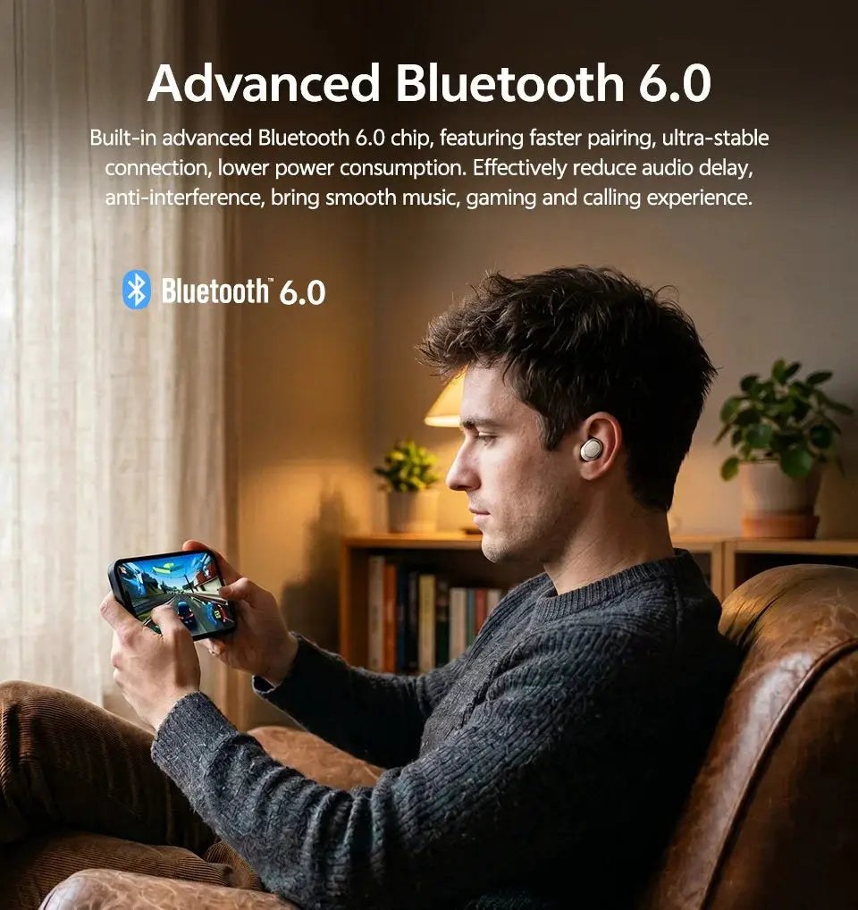 QCY MeloBuds A30 wireless earbuds, white, worn by man gaming indoors