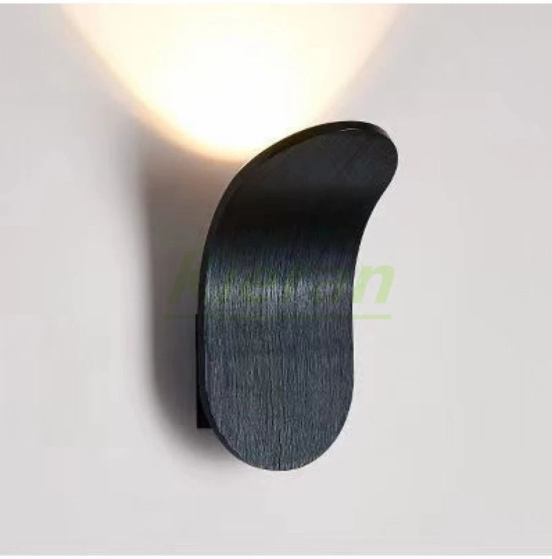 Nordic modern skateboard LED wall lamp in black brushed finish for bedroom or living room decor, Simples Market.