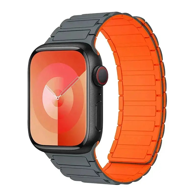 Magnetic loop Apple Watch band with gray outer links and orange silicone inner strap