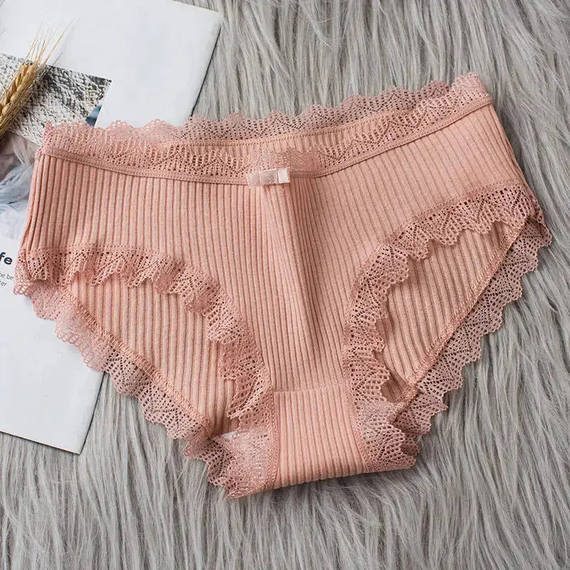 4-piece set of peach lace-trim bikini panties with ribbed texture and scalloped edges
