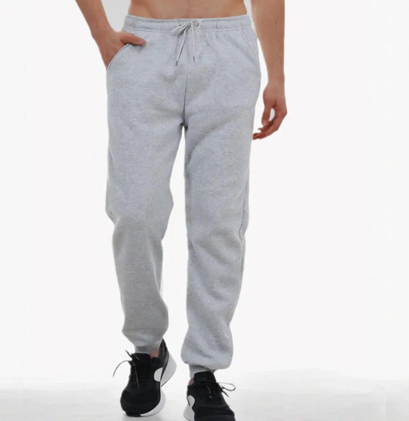 Men's light gray fleece jogger sweatpants with drawstring waist and side pockets.