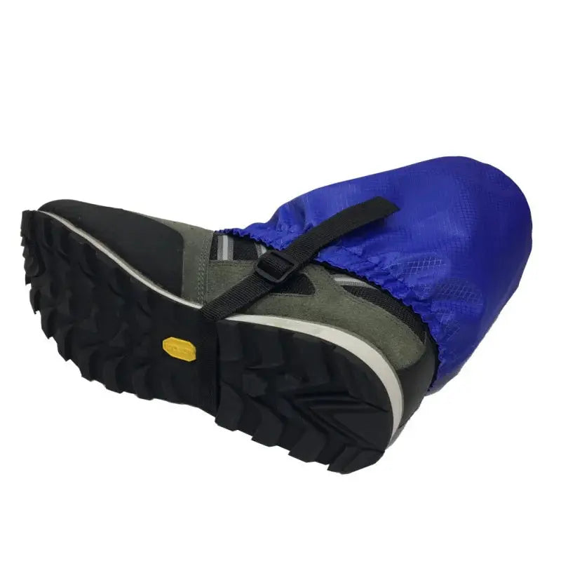 Blue waterproof legging gaiter for hiking and skiing; protective boot cover with strap