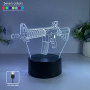 Gun-shaped LED night light with seven-color RGB lighting, USB powered.