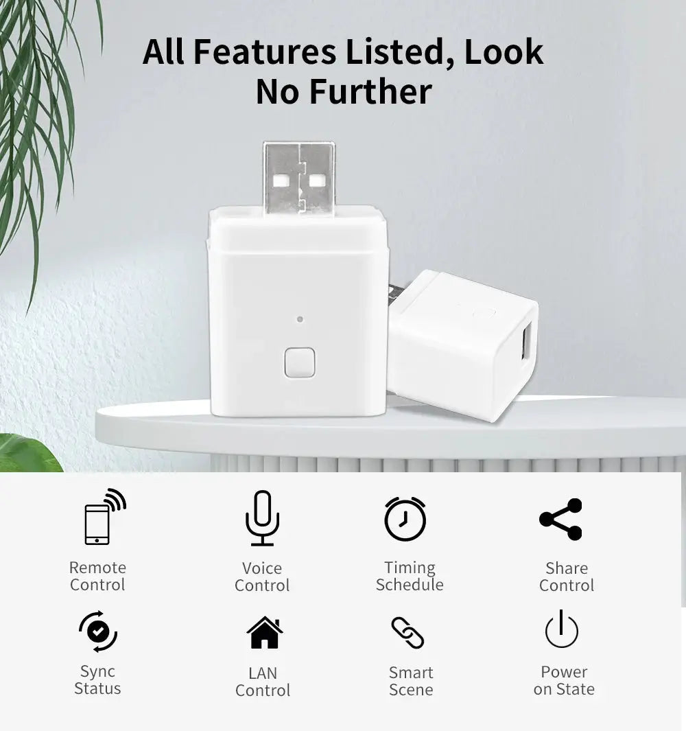 White USB power adapter pair with a square button and USB-A plug on a table
