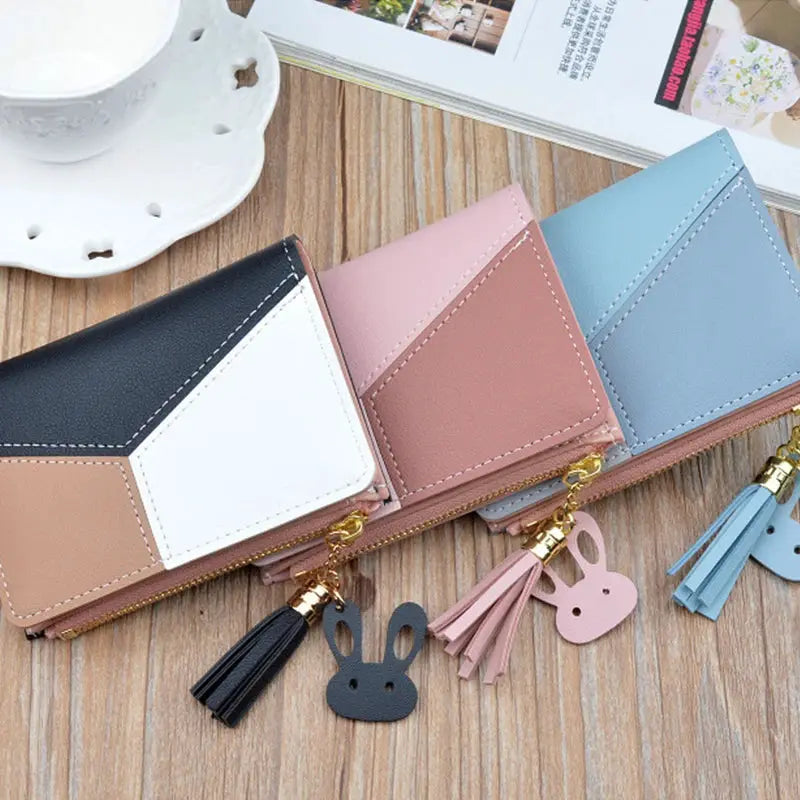 Simples Market PU leather wallets set of 4 in pastel color blocks with tassel charms