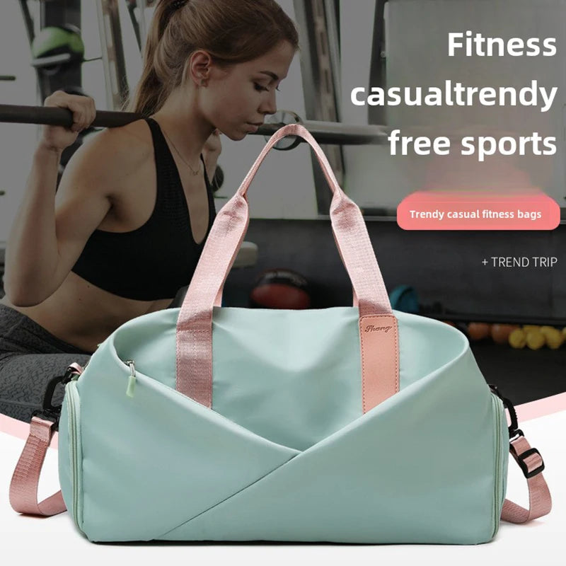 Multi-functional gym bag in pastel aqua with pink handles, large-capacity waterproof travel bag