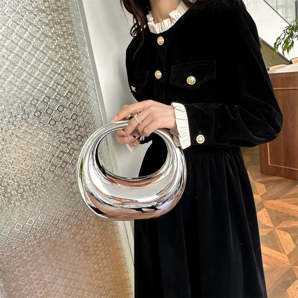 MOODS Golden Evening Handbag round silver PVC clutch with circular handle