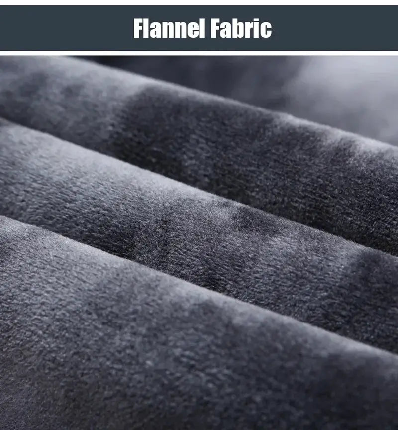 Flannel fabric close-up in dark grey with soft plush texture