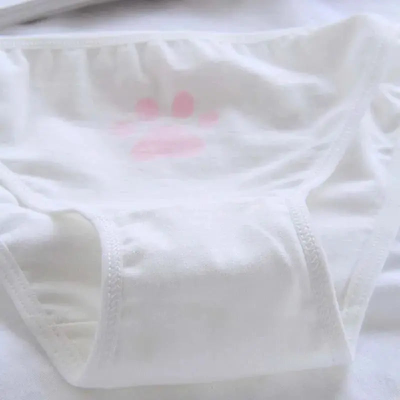 Women's cotton panties in white with pink paw print design.